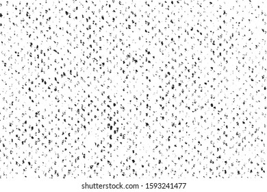 Small uneven spots and particles of debris. Abstract vector texture.  Distressed uneven background. Grunge texture overlay with fine grains isolated on white background. Vector illustration. EPS10.
