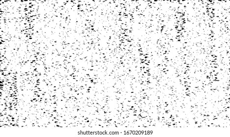Small uneven spots and particles of debris. Abstract vector texture.  Distressed uneven background. Grunge texture overlay with fine grains isolated on white background. Vector illustration. EPS10.