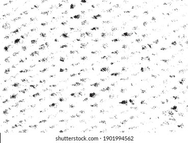 Small uneven spots and particles of debris. Abstract vector texture.  Distressed uneven background. Grunge texture overlay with fine grains isolated on white background. Vector illustration. EPS10.