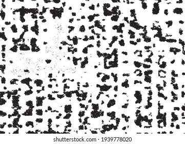 Small uneven spots and particles of debris. Abstract vector texture.  Distressed uneven background. Grunge texture overlay with fine grains isolated on white background. Vector illustration. EPS10.