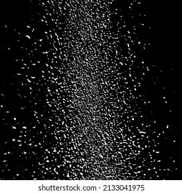 Small uneven spots and particles of debris. Abstract vector texture.  Distressed uneven background. Grunge texture overlay with fine grains isolated on white background. Vector illustration. EPS10.