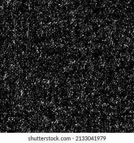 Small uneven spots and particles of debris. Abstract vector texture.  Distressed uneven background. Grunge texture overlay with fine grains isolated on white background. Vector illustration. EPS10.