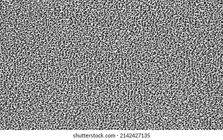Small uneven spots and particles of debris. Abstract vector texture.  Distressed uneven background. Grunge texture overlay with fine grains isolated on white background. Vector illustration. EPS10.