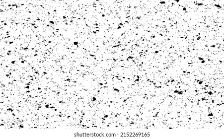 Small uneven spots and particles of debris. Abstract vector texture.  Distressed uneven background. Grunge texture overlay with fine grains isolated on white background. Vector illustration. EPS10.