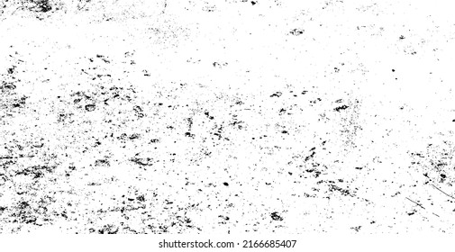 Small uneven spots and particles of debris. Abstract vector texture.  Distressed uneven background. Grunge texture overlay with fine grains isolated on white background. Vector illustration. EPS10.