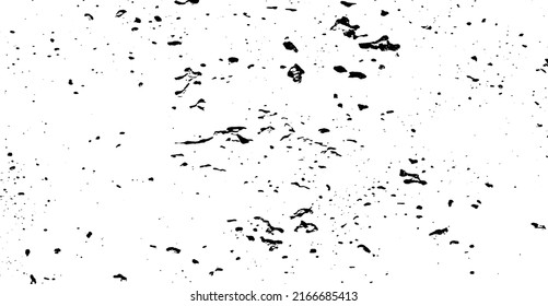 Small uneven spots and particles of debris. Abstract vector texture.  Distressed uneven background. Grunge texture overlay with fine grains isolated on white background. Vector illustration. EPS10.