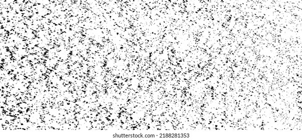 Small uneven spots and particles of debris. Abstract vector texture.  Distressed uneven background. Grunge texture overlay with fine grains isolated on white background. Vector illustration. EPS10.