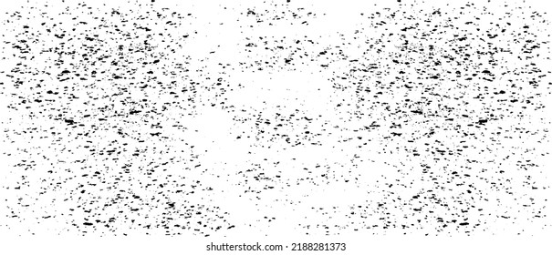 Small uneven spots and particles of debris. Abstract vector texture.  Distressed uneven background. Grunge texture overlay with fine grains isolated on white background. Vector illustration. EPS10.