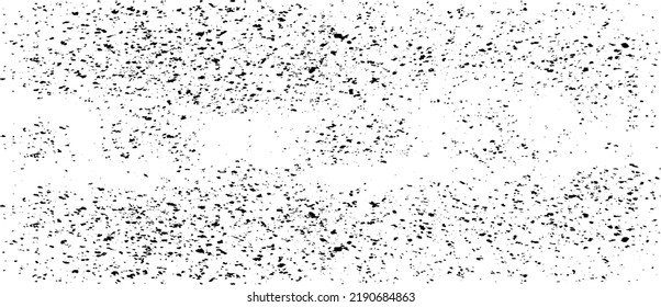 Small uneven spots and particles of debris. Abstract vector texture.  Distressed uneven background. Grunge texture overlay with fine grains isolated on white background. Vector illustration. EPS10.