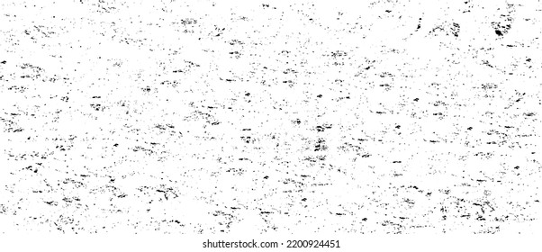 Small uneven spots and particles of debris. Abstract vector texture.  Distressed uneven background. Grunge texture overlay with fine grains isolated on white background. Vector illustration. EPS10.