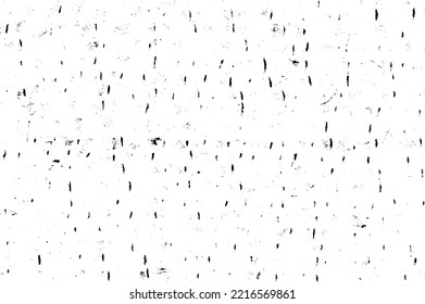 Small uneven spots and particles of debris. Abstract vector texture.  Distressed uneven background. Grunge texture overlay with fine grains isolated on white background. Vector illustration. EPS10.