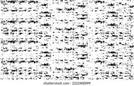 Small uneven spots and particles of debris. Abstract vector texture.  Distressed uneven background. Grunge texture overlay with fine grains isolated on white background. Vector illustration. EPS10.