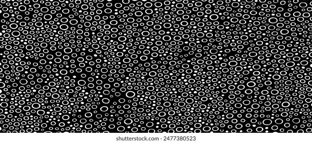 Small uneven spots and particles of debris. Abstract vector texture.  Distressed uneven background. Grunge texture overlay with fine grains isolated on white background. Vector illustration. EPS10.