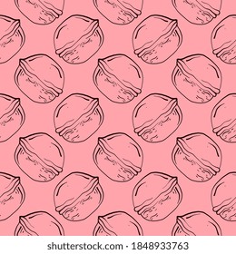 Small walnut, seamless pattern on pink background.