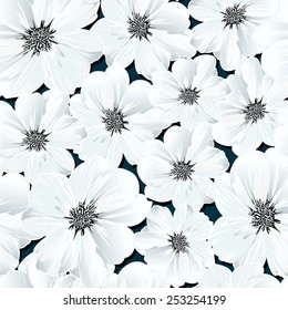 Small white flowers in a seamless pattern .