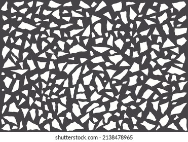 Small white fragments of various shapes on a gray background. Freehand drawing. Doodle. Hand Drawn.