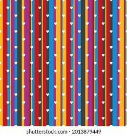 Small white hearts on a background of bright multicolored stripes. Seamless striped background.