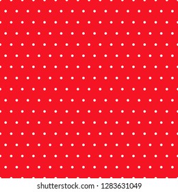 
Small white polka dots on a red background.