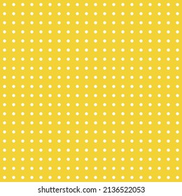 Pequeños puntos de polka blanca sobre fondo amarillo