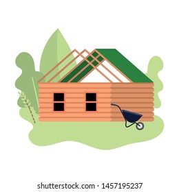Small wood house under construction with green roof
