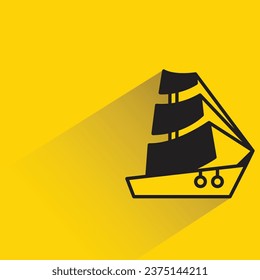 small yacht with shadow on yellow background
