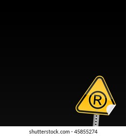 Small yellow road hazard warning sign with registered symbol and with curved corner on black background