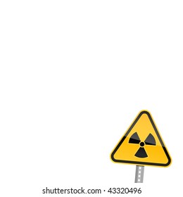 Small yellow road warning sign with radiation symbol on white background