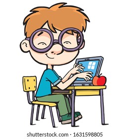 smart boy with glasses sits by his laptop and has an apple on his desk