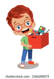smart boy who collects his toys and stuffs them in the box