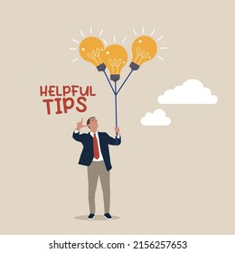 Smart businessman holding lightbulb ideas balloon telling helpful tips. Helpful tips for business, useful ideas or smart trick to success, advice or suggestion information for improvement concept.