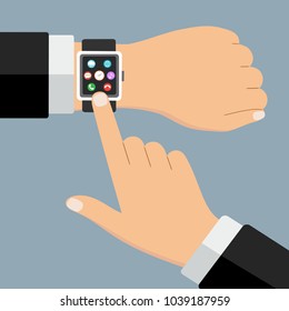 smart clock on a hand on a gray background