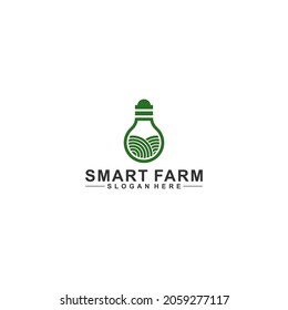 smart farm logo with bulb and farmland reflecting intelligence in gardening or growing plants