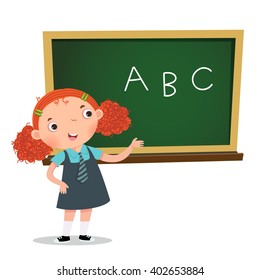 Smart girl presenting something in front of blackboard