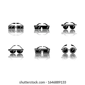 Smart glasses drop shadow black glyph icons set. Smartglasses. Wearable computer optical gadgets. Augmented reality technology. Monitoring. Isolated vector illustrations on white space