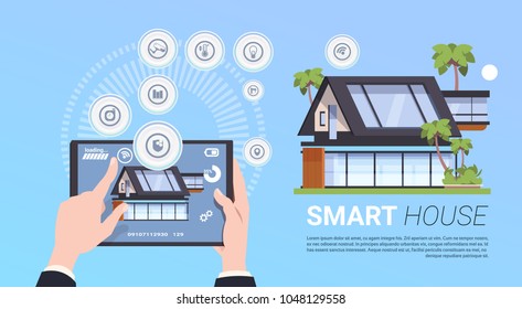 Smart Home Administration And Control Technology System Concept With Hands Holding Digital Tablet