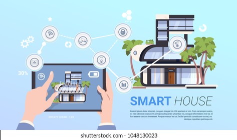 Smart Home Control technology Concept With Hands Holding Digital Tablet