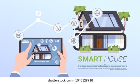 Smart Home Management Concept With Hands Holding Tablet Device