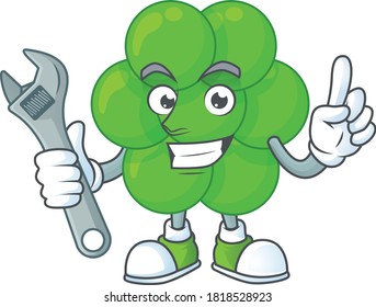 A smart mechanic staphylococcus aureus cartoon mascot design fix a broken machine. Vector illustration