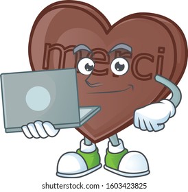 Smart one bite love chocolate cartoon character working with laptop