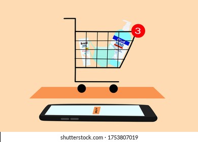 Smart phone has ‘buy’ orange button on screen. The shopping cart has a face mask and hand sanitizer inside. Contactless online purchase of goods using your phone. Digital Wireless app Technology.