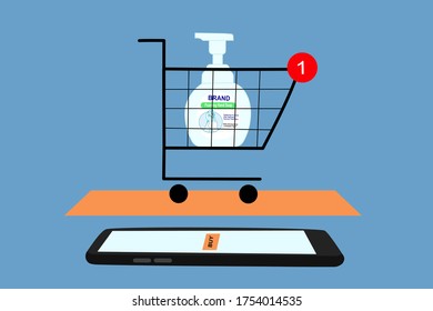 Smart phone has ‘buy’ orange button on screen. The shopping cart has a hand soap foam bottle inside. Contactless online purchase of goods using your phone. Digital Wireless app Technology.