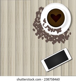 smart phone and hot coffee on wood background