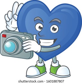 Smart Photographer blue love cartoon mascot with a camera