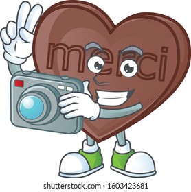 Smart Photographer one bite love chocolate cartoon mascot with a camera