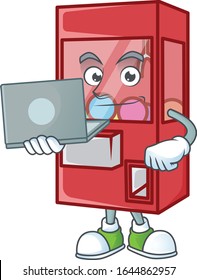 A smart toy claw machine mascot icon working with laptop