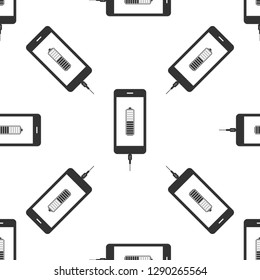 Smartphone battery charge icon seamless pattern on white background. Phone with a low battery charge and with USB connection. Flat design. Vector Illustration