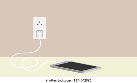 Teléfono inteligente cargando en la pared con espacio para copiar.