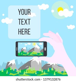 Smartphone in hand against the background of the landscape. Mountain landscape. Traveling with a smartphone. Photos on the smartphone. Place for your text.