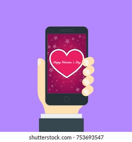 Smartphone in the hand in a flat style. On the phone screen the heart and background of the stars. St. Valentine's Day.
