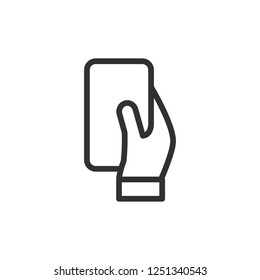 smartphone in hand. linear icon. Line with editable stroke